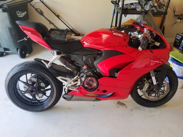 Motorcycle detailing and ceramic coating result showing deep shine and protection