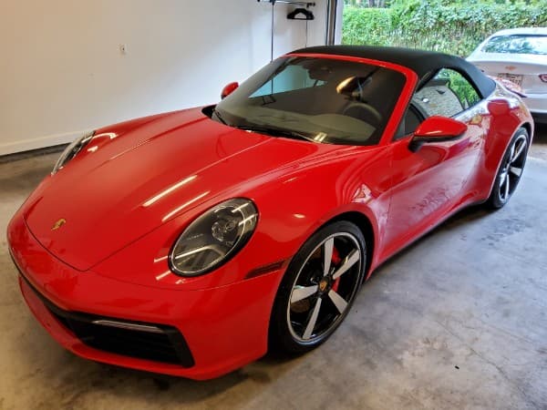 Ceramic coating service showing a vehicle with a glossy finish