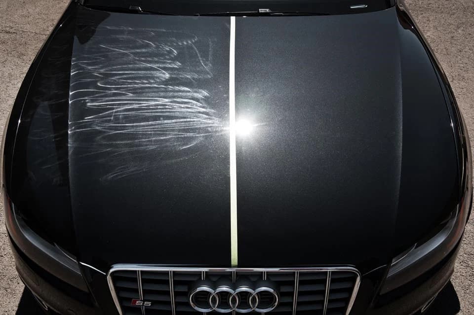 Paint correction service showing a vehicle with swirls and scratches removed